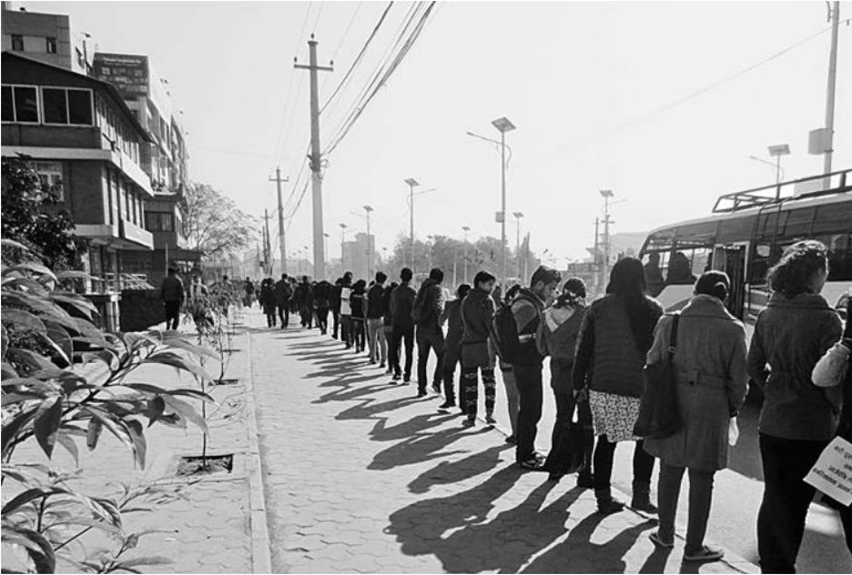 Figure 2 Protesters join hands to call for citizenship in the name of the mother.  Photo: Dannah Dennis